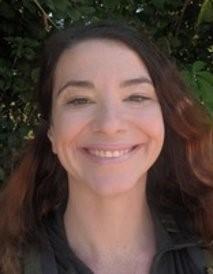 Portrait of Dr. Sarah Stednitz, smiling at the camera