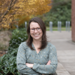 Kristen smiling on campus